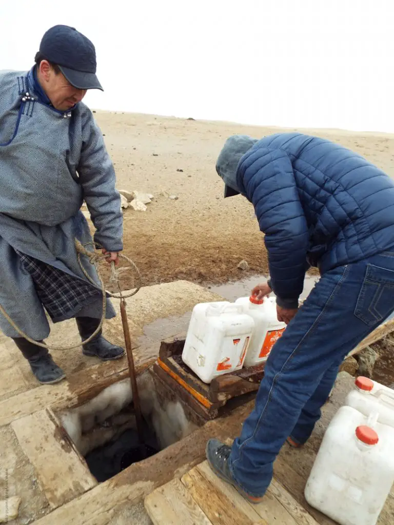 Drawing well water in Mongolia Gobi desert