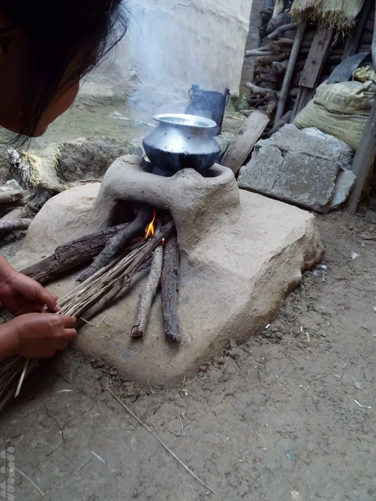 Chitwan National Park Tharu Village rice cooking