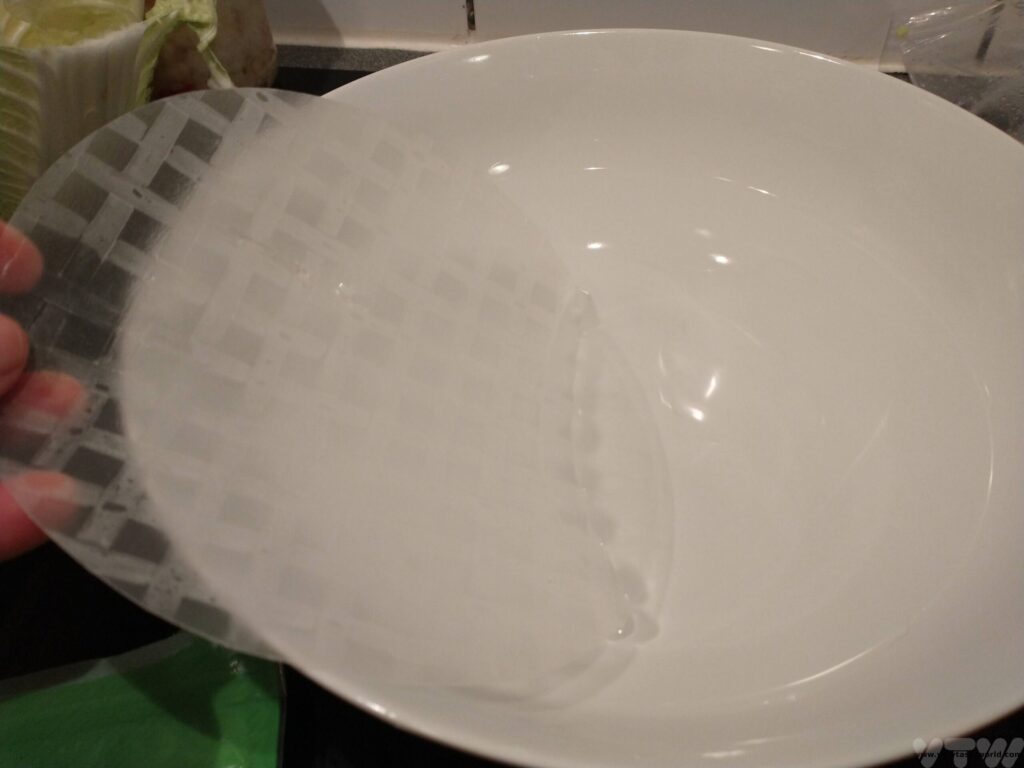 vietnamese spring roll wrapper being soaked