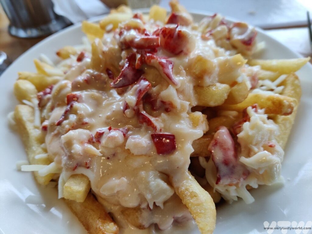 Lobster dinner in nova scotia - lobster poutine
