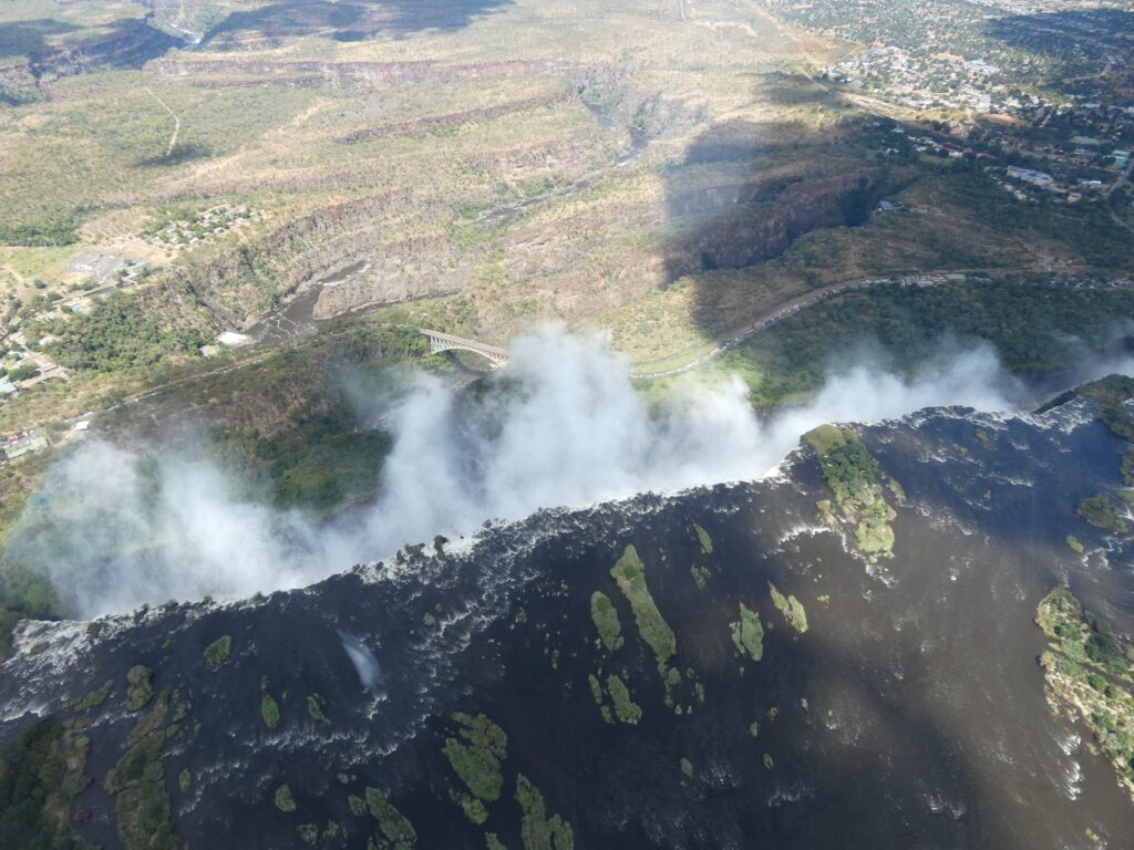 Spray from the Victoria Falls from above - the smoke that thunders