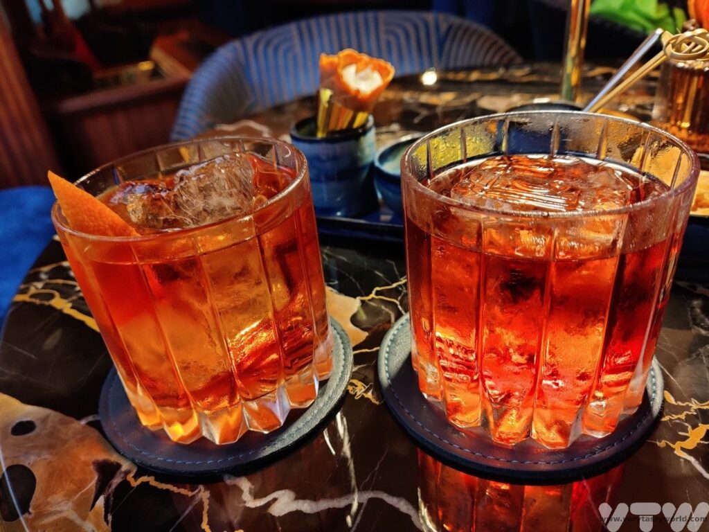 what food is florence famous for - two glasses of negroni cocktail