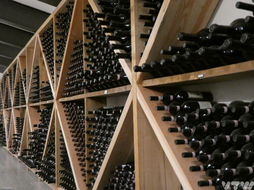 a chianti wine rack - showing bottles of wine in a huge rack against the wall