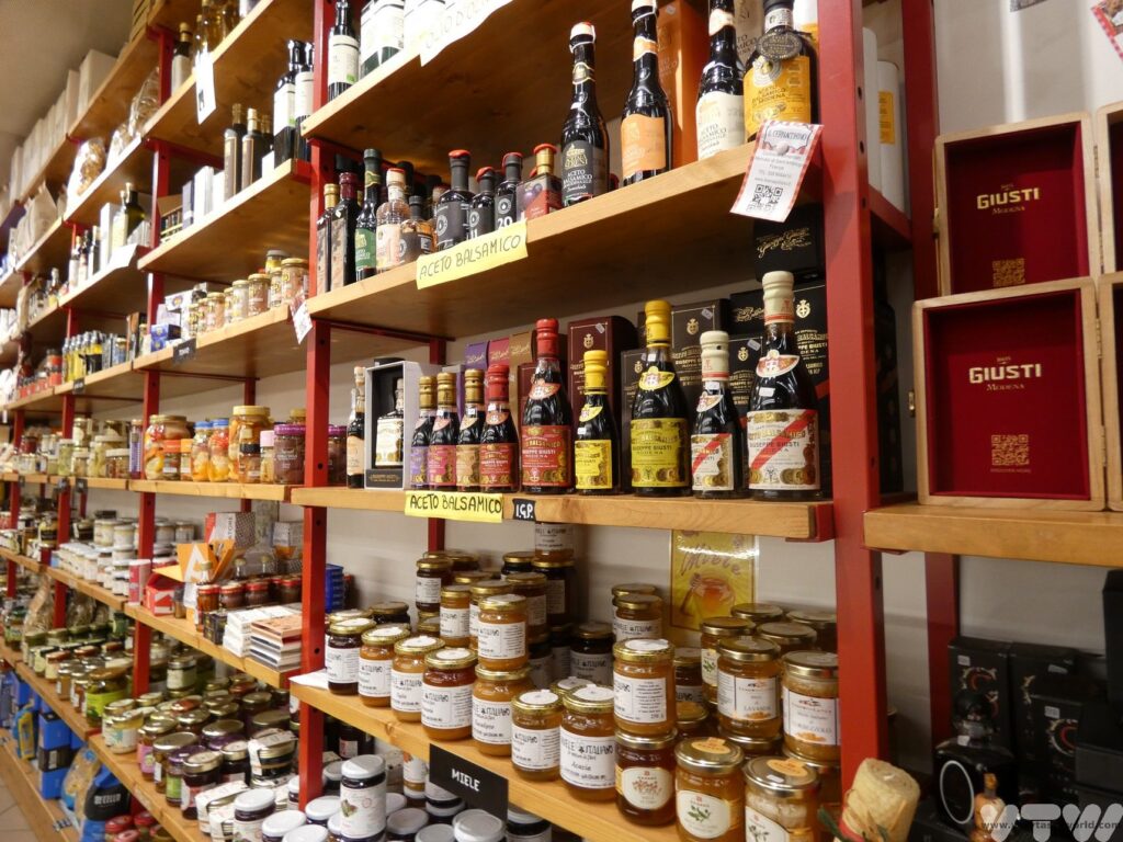 Sant'Ambrogio market stall showing all sorts of bottled products