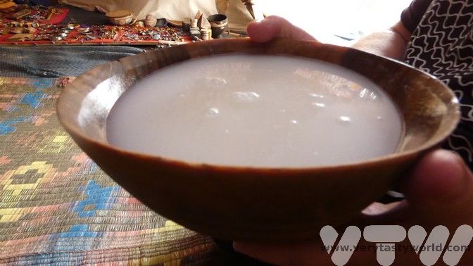 the food of mauritania - a wooen bowl filled with camel milk