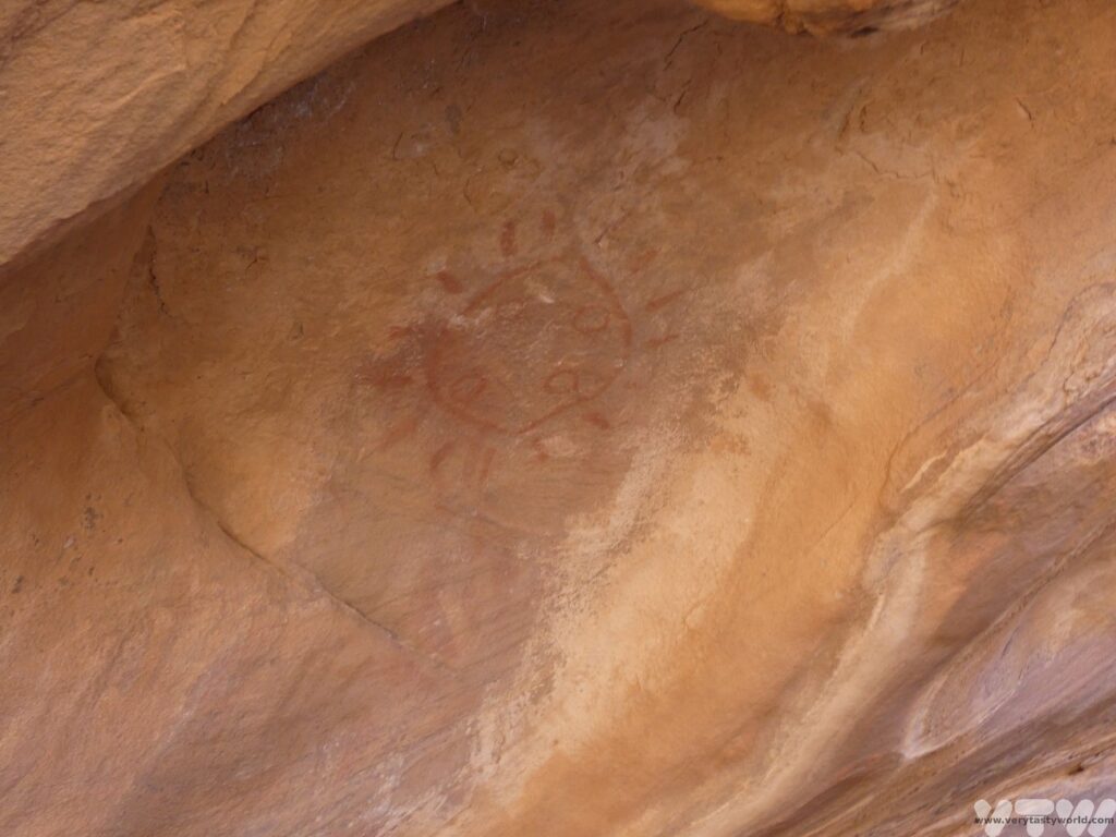 5000 year old petroglyph of the sun, with four circles depicting the seasons