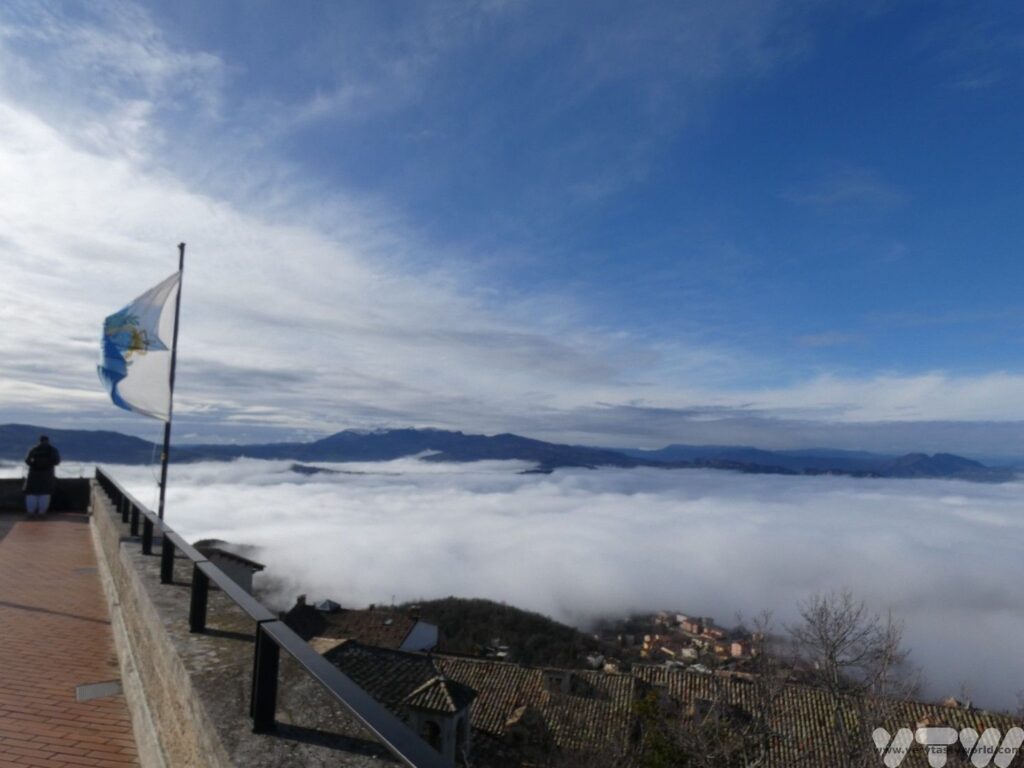 View of the misty valley from San Marino