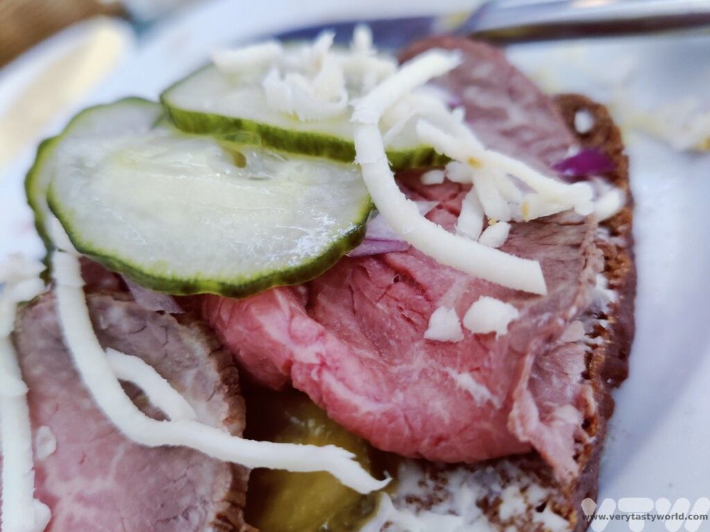 roast beef, horseradish and pickle open sandwich
