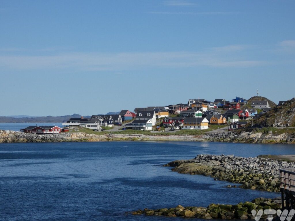 Things to do in Nuuk Greenland, view of old harbour with colourful buildings on the shore
